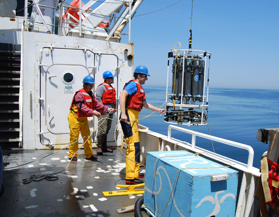 A CTD to measure conductivity, temperature and density of seawater, is deployed from R/V Endeavor during a GOMTOX cruise