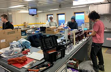Everyone busy at work packing up the main lab! (Photo by Ashley Arroyo)