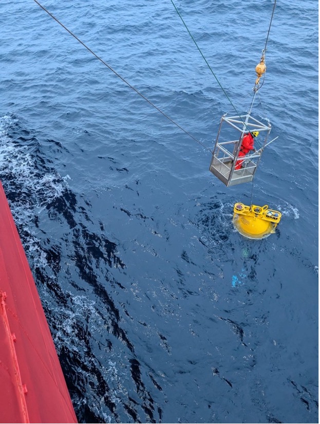 For one final time this trip, Jerome Sibley readies to hook the mooring’s surface float (Photo by Mary-Louise Timmermans) 