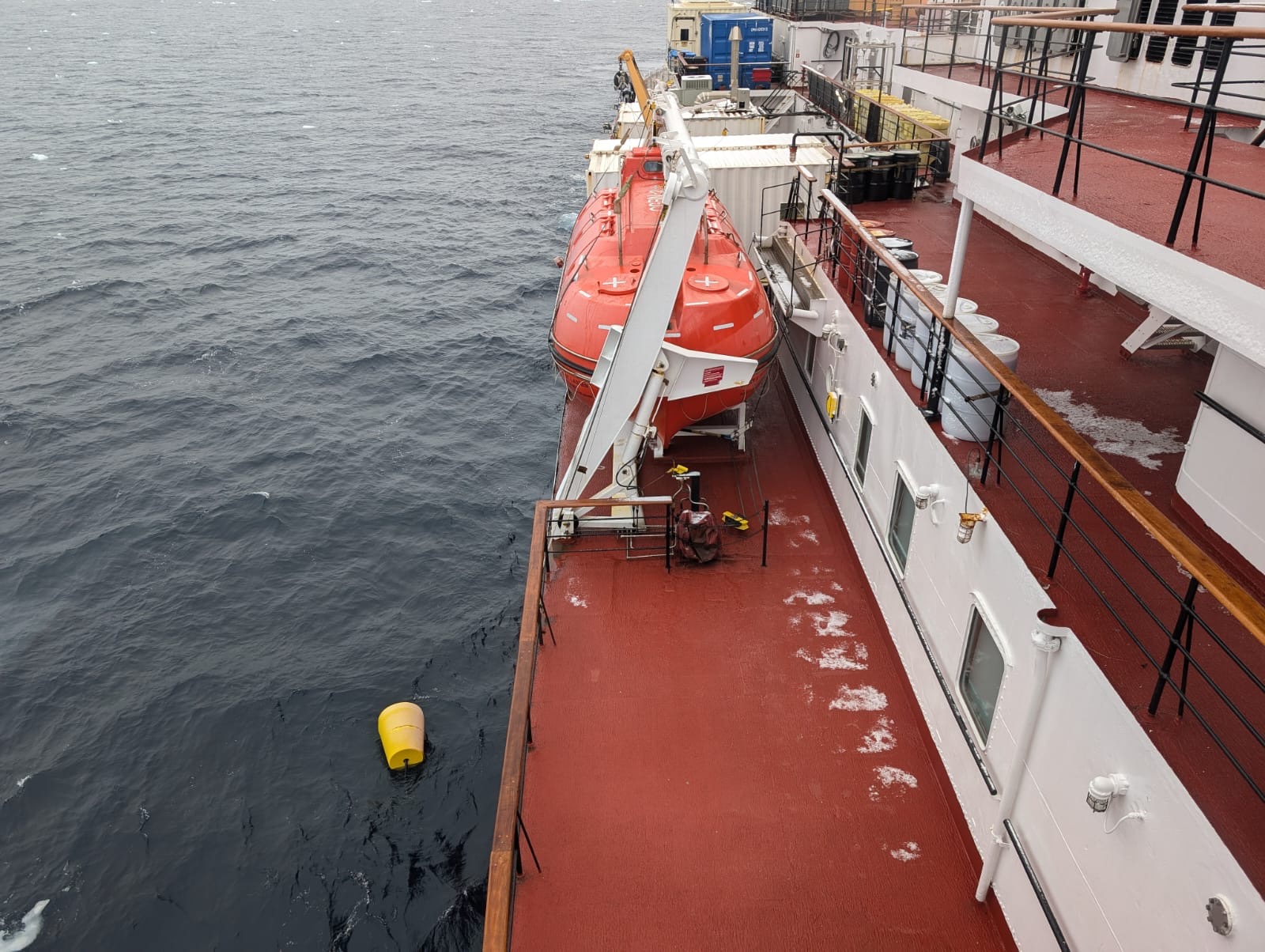 ITP 136 floating alongside the hull, waiting for pickup (Photo by Mary-Louise Timmermans)