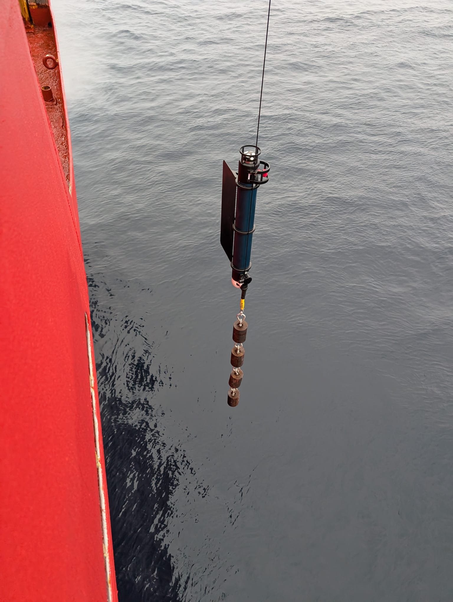 TOP profiling unit (with fins) and weights suspended over the side of the Louis (Photo by Mary-Louise Timmermans)