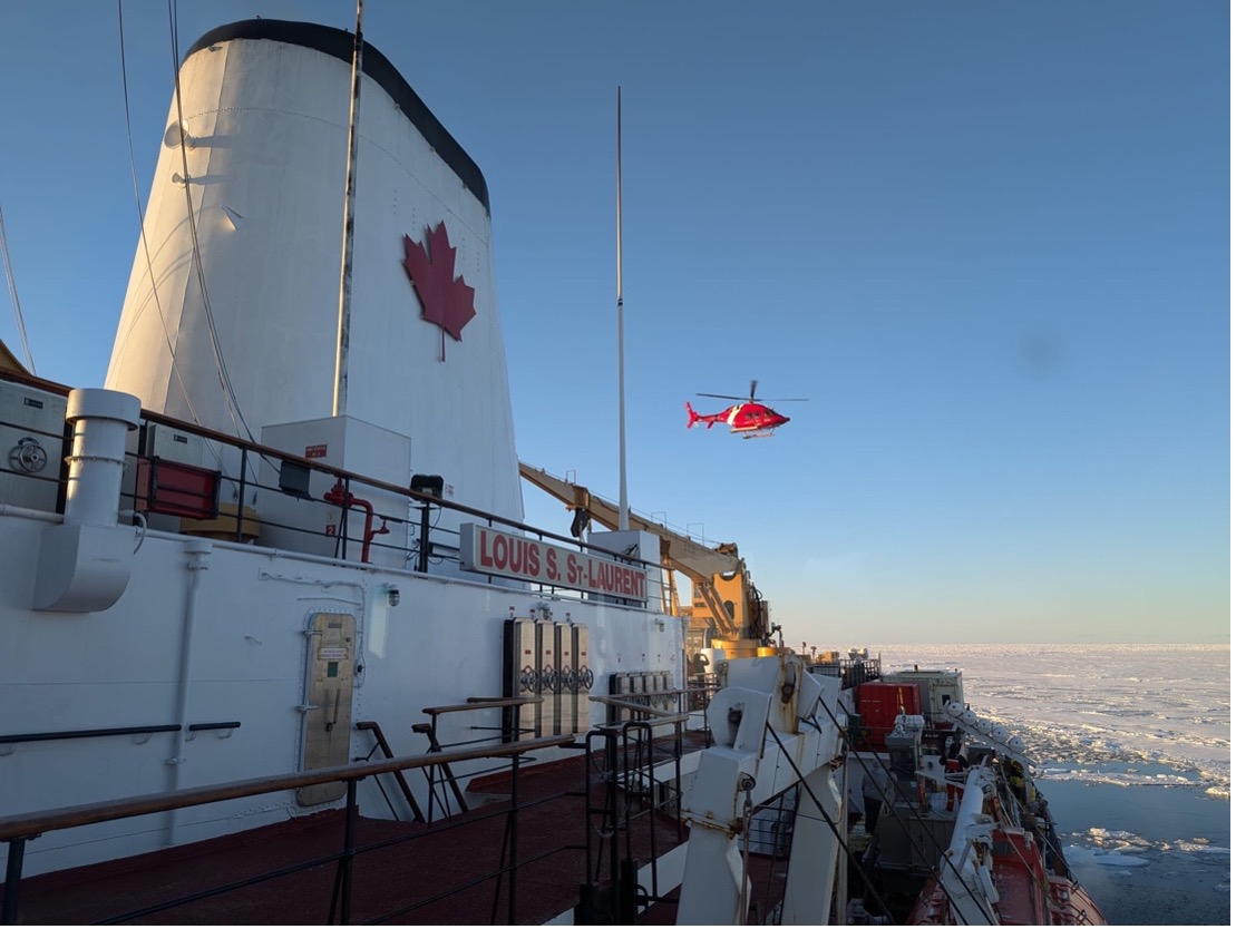 Helicopter on the hunt for a perfect floe (Photo by Mary-Louise Timmermans)