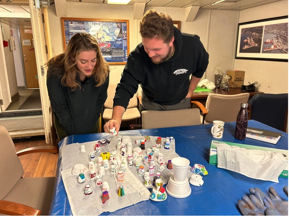 Seth Fleming-Alho and Mackenzie Mueller admiring the shrinky cups (Photo by Sarah Zimmermann)