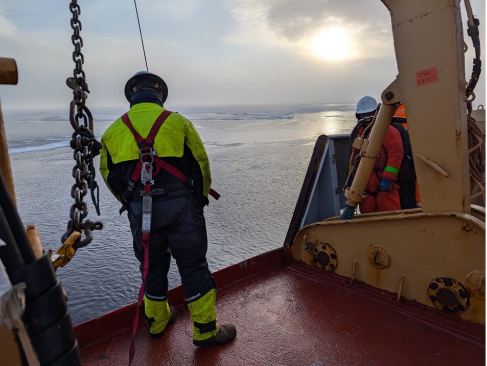 Nico Llanos monitors the mooring being winched onto the ship