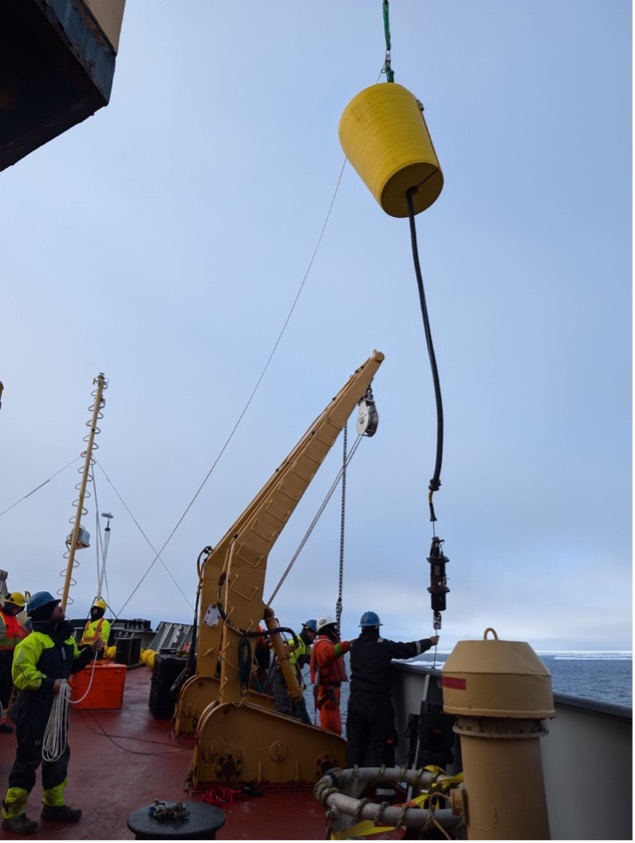 ITP 143 surface package and SAMI suspended over the deck for deployment