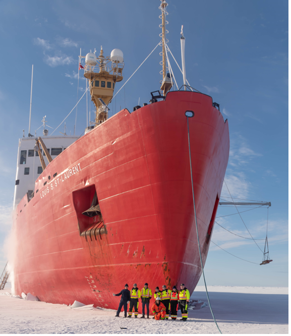 Captain and crew members on the ice (Photo by Gary Morgan) 