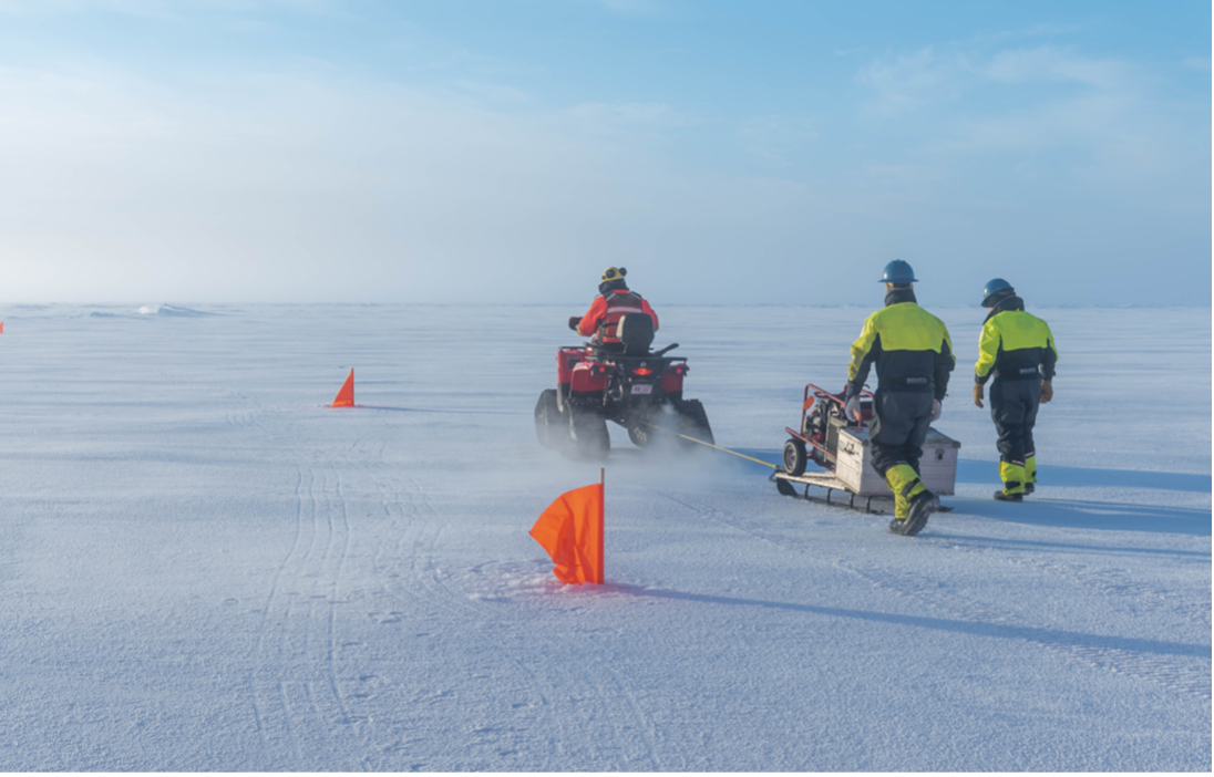 Jerome Sibley using the ATV to transport equipment to buoy sites (Photo by Gary Morgan)