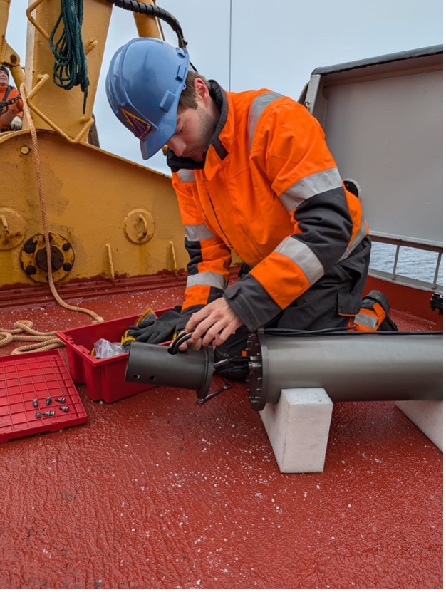 Tim McDonough prepares the TOP surface package.