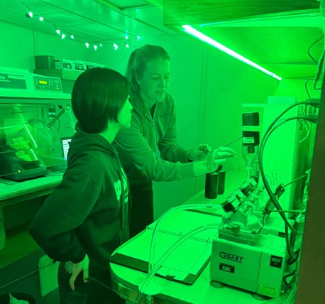 Watch-leader Paige Hagel demonstrating the procedure for filtering chlorophyll samples. Photo by Annabel Payne. 