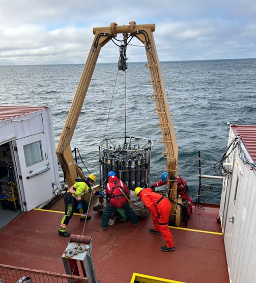 Photo 1: The CTD rosette being brought back on board after a successful cast at AG-5. Photo by Sarah Zimmerman. 