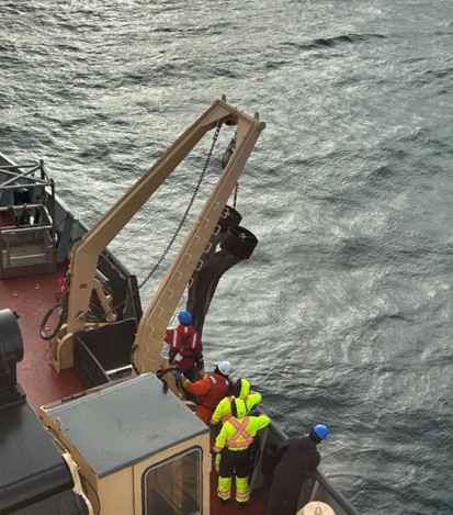Photo 4: Bongo nets being deployed to collect a zooplankton sample. Photo by Sarah Zimmerman. 