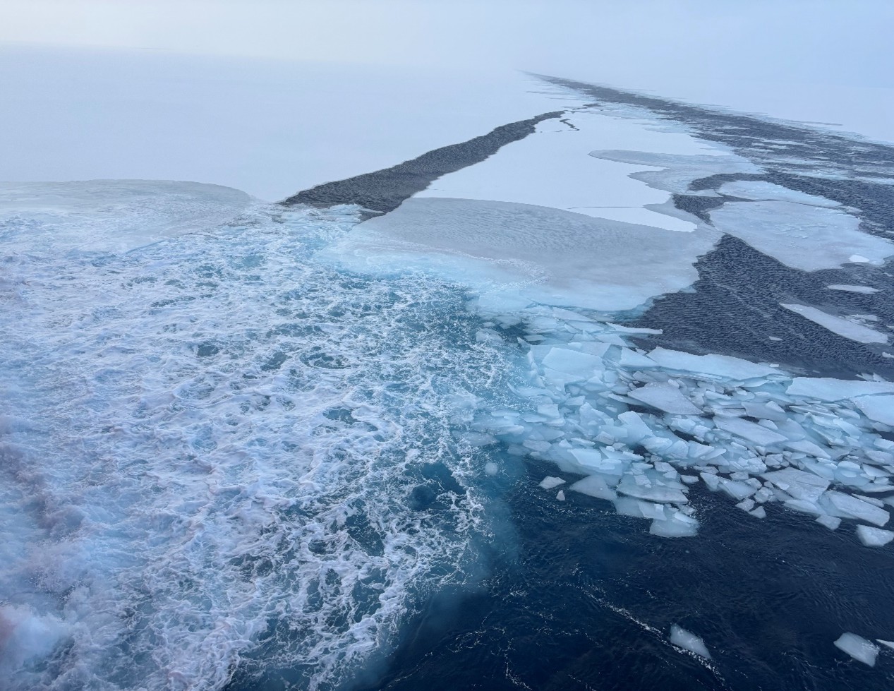 Photo 1: The ship’s bubbler clearing a hole in the ice for the CTD rosette cast at CB-8. 