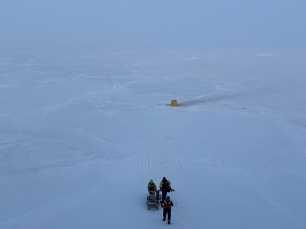 Photo 3: Members of the BGOS team and crew packing up after the successful TOP deployment. 