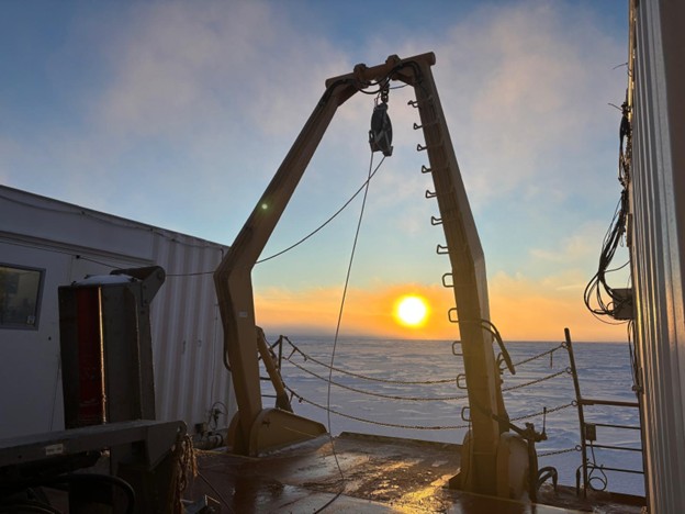 Photo 4: Sunset behind the CTD A-frame on the starboard side of the Louis. 
