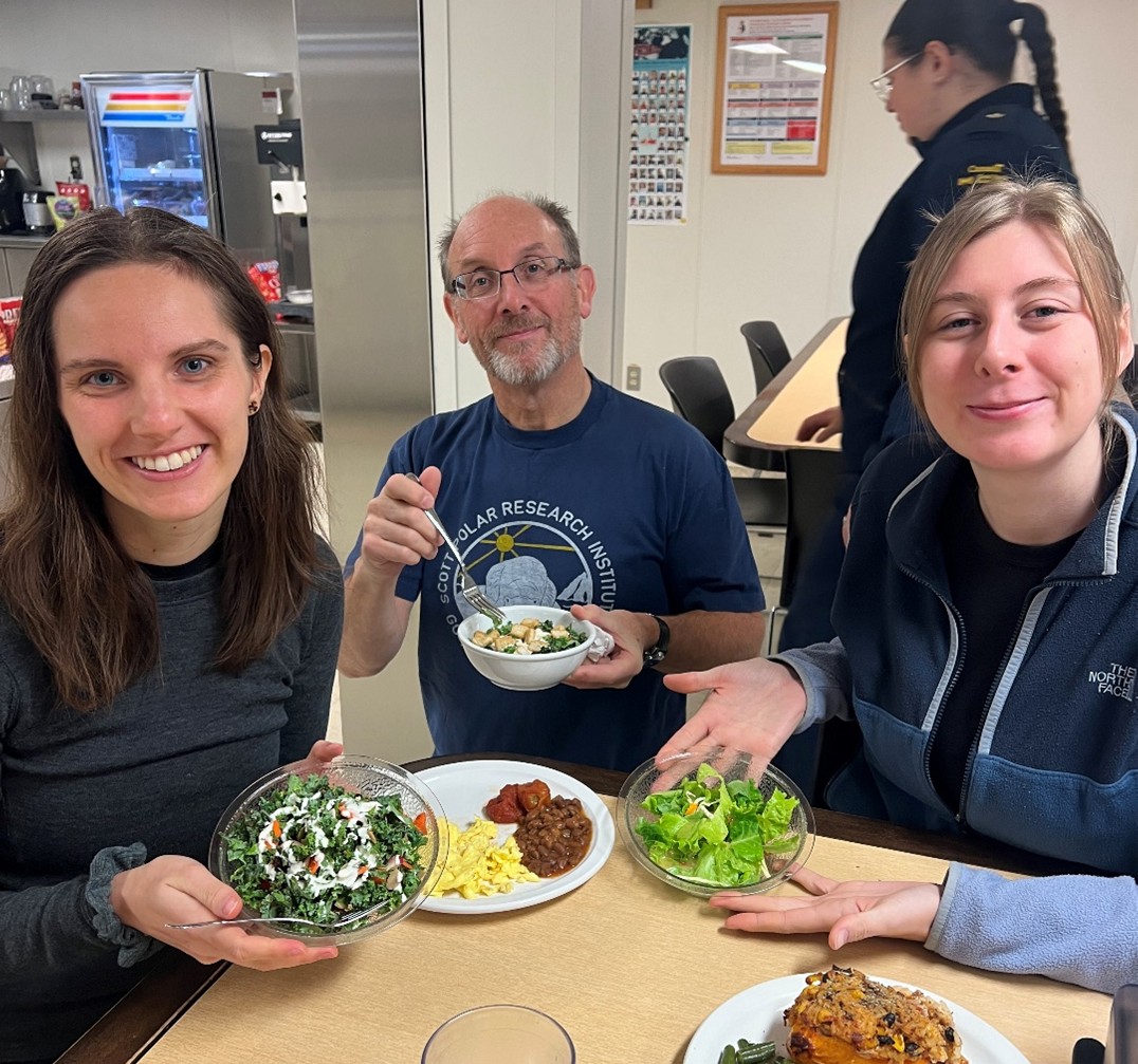 Dispatch28Photo5 Photo 5: (left to right) Jennifer Kosty, Andrew Ross, and Dominique Baker enjoying salads at lunch. Photo by Annabel Payne.