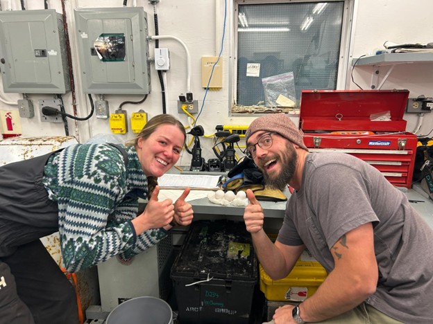 Dispatch30Photo4 Photo 4: Paige Hagel (left) and Chris Clarke (right) after discovering that the eggs survived. Photo by Sarah Zimmermann.