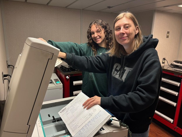 Dispatch34Photo4 Photo 4: Collette Leclerc (left) and Dominique Baker (right) scanning documents from this year’s cruise.