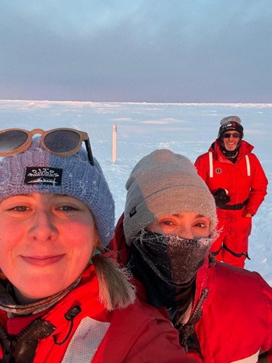 Picture5 Photo 3: (left to right) Dominique Baker, Annabel Payne, and Andrew Ross taking a selfie with the seasonal ice mass balance buoy (SIMB). Photo by Dominique Baker.