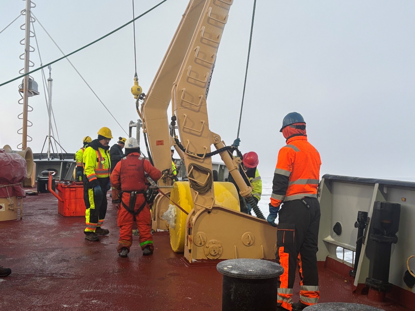 Picture5 Photo 2: TOP14’s surface instrument package being brought on board by Jim Ryder and Rico Amamio.