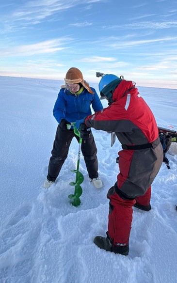 Picture6 Photo 4: Sarah Zimmermann (left) and Takuji Waseda (right) drilling a hole to collect a water sample. Photo by Dominique Baker.