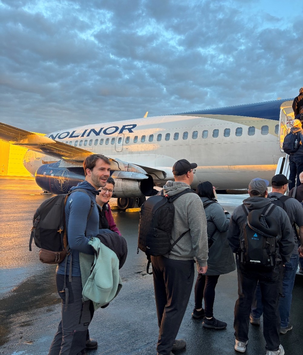 Members of the science team and ship’s crew boarding the charter flight to Cambridge Bay in St. John’s, Newfoundland, Canada on September 17, 2026. Photo by Jennifer Kosty.