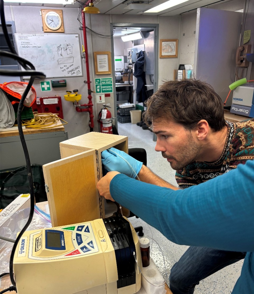 Clement Feriot preparing to analyze dissolved organic matter (DOM) samples. Photo by Jennifer Kosty. 