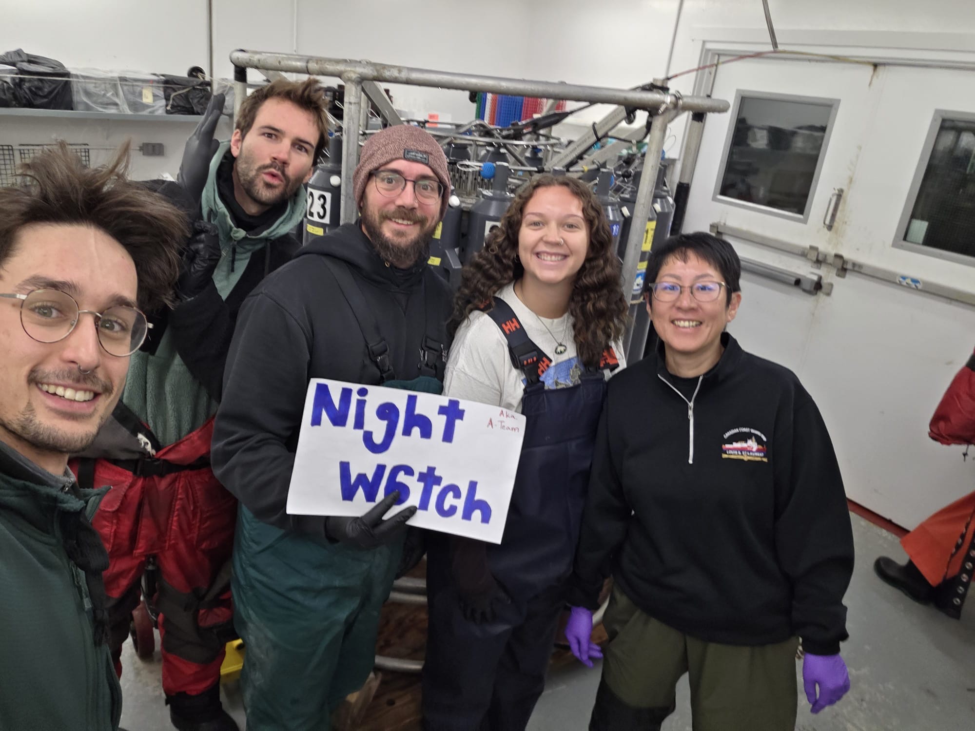 The night watch (left to right: Kalum Delaney, Clement Feriot, Chris Clarke, Collette Leclerc, Michiyo Yamamoto-Kawai) posing with the CTD-rosette. Photo by Kalum Delaney. 