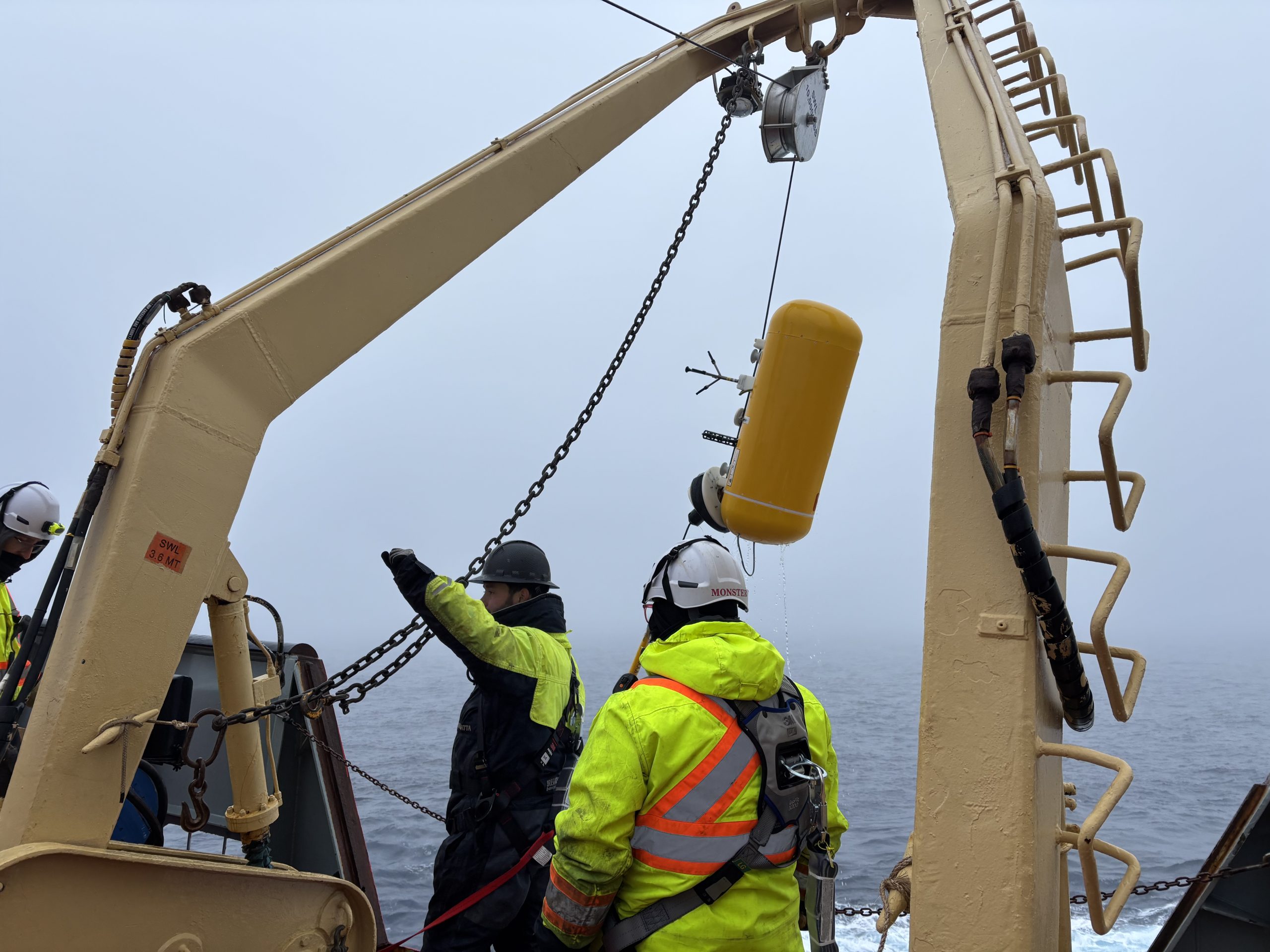 Chris Basque and bosun Ashley recovering one of Mooring D’s McClane Moored Profilers. Photo by Jennifer Kosty. 