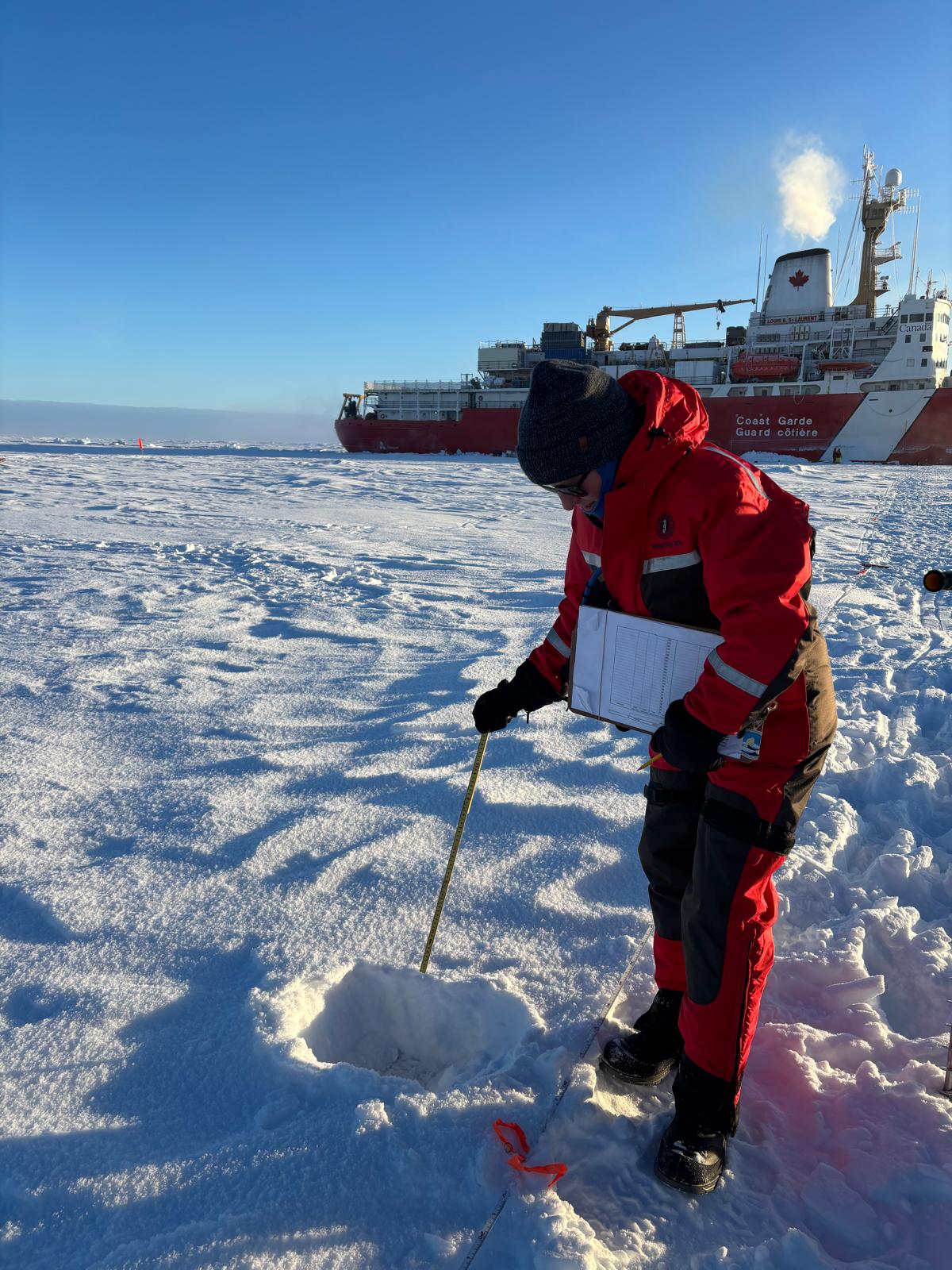 Monika collecting a snow thickness measurement during one of our ice stations. Photo by Jennifer Kosty. 