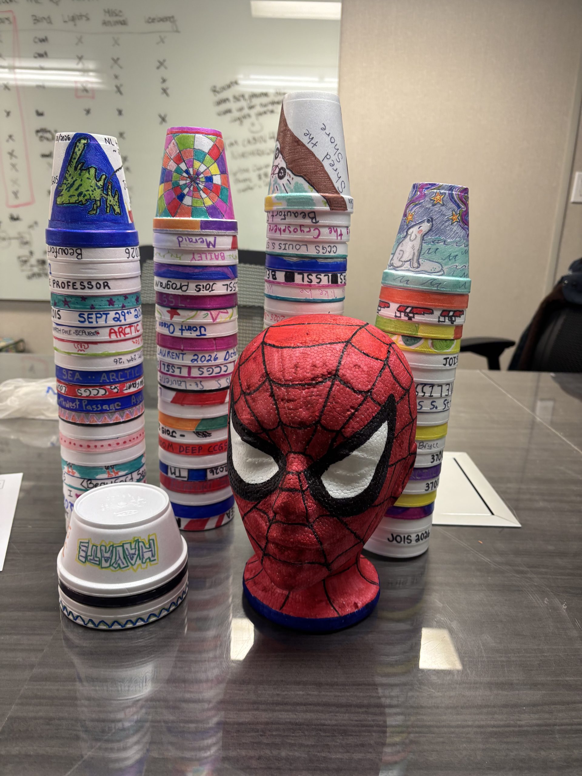 The decorated foam cups (and one foam head) before being shrunk. Photo by Jennifer Kosty. 