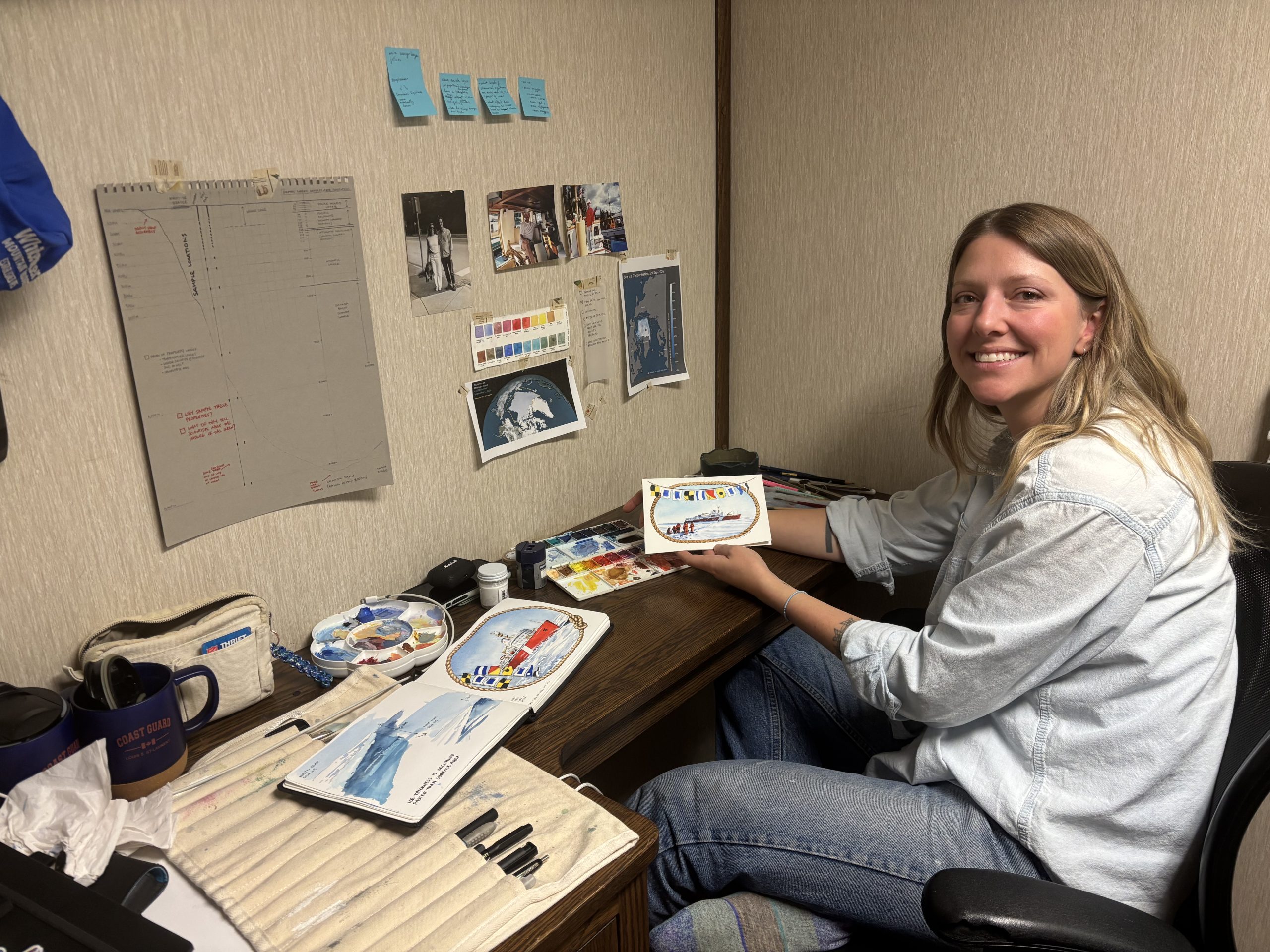 Monika painting in her cabin. Photo by Jennifer Kosty. 