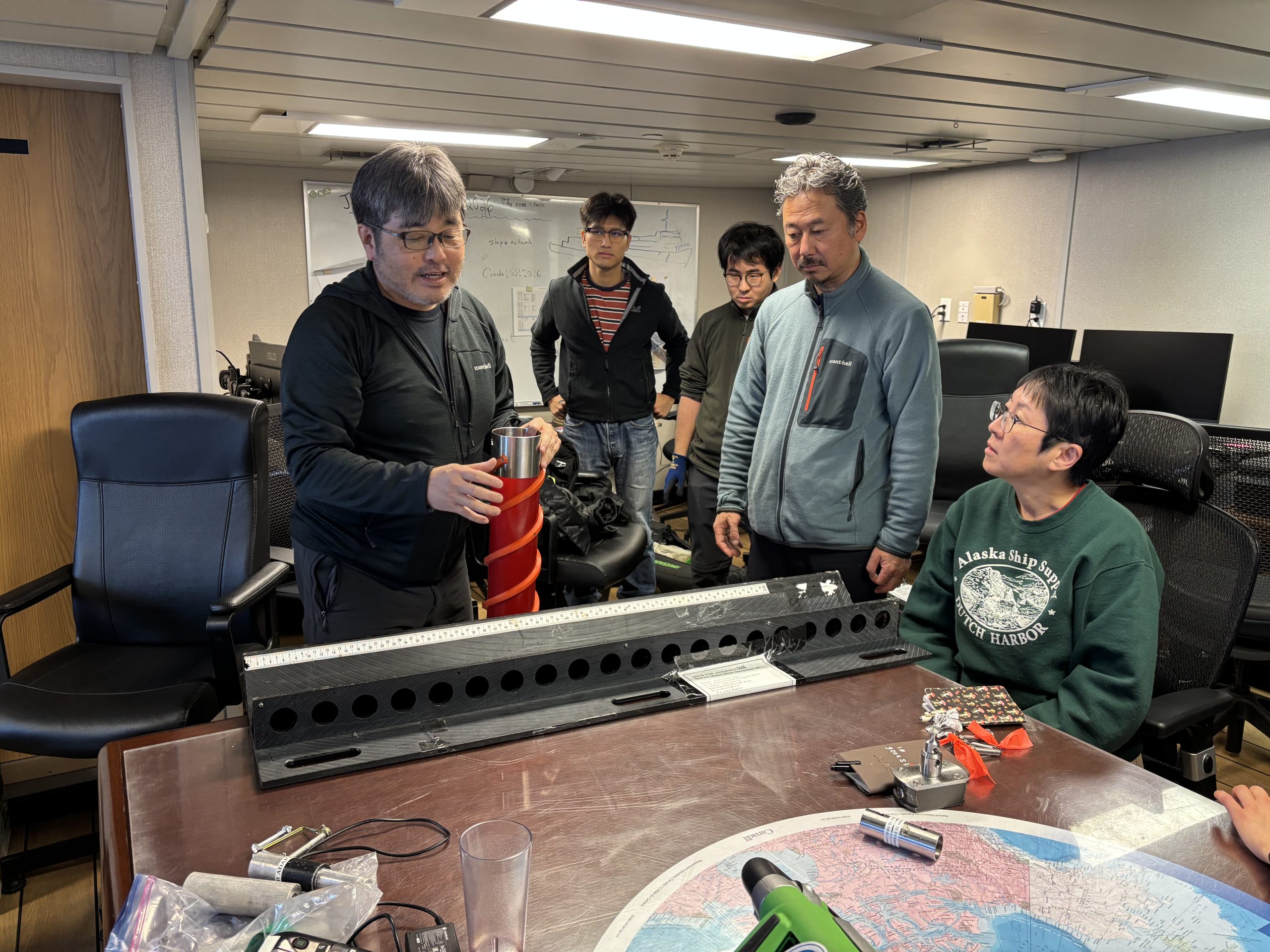 Kazu Tateyama explaining the ice core sampling procedure. Photo by Jennifer Kosty. 
