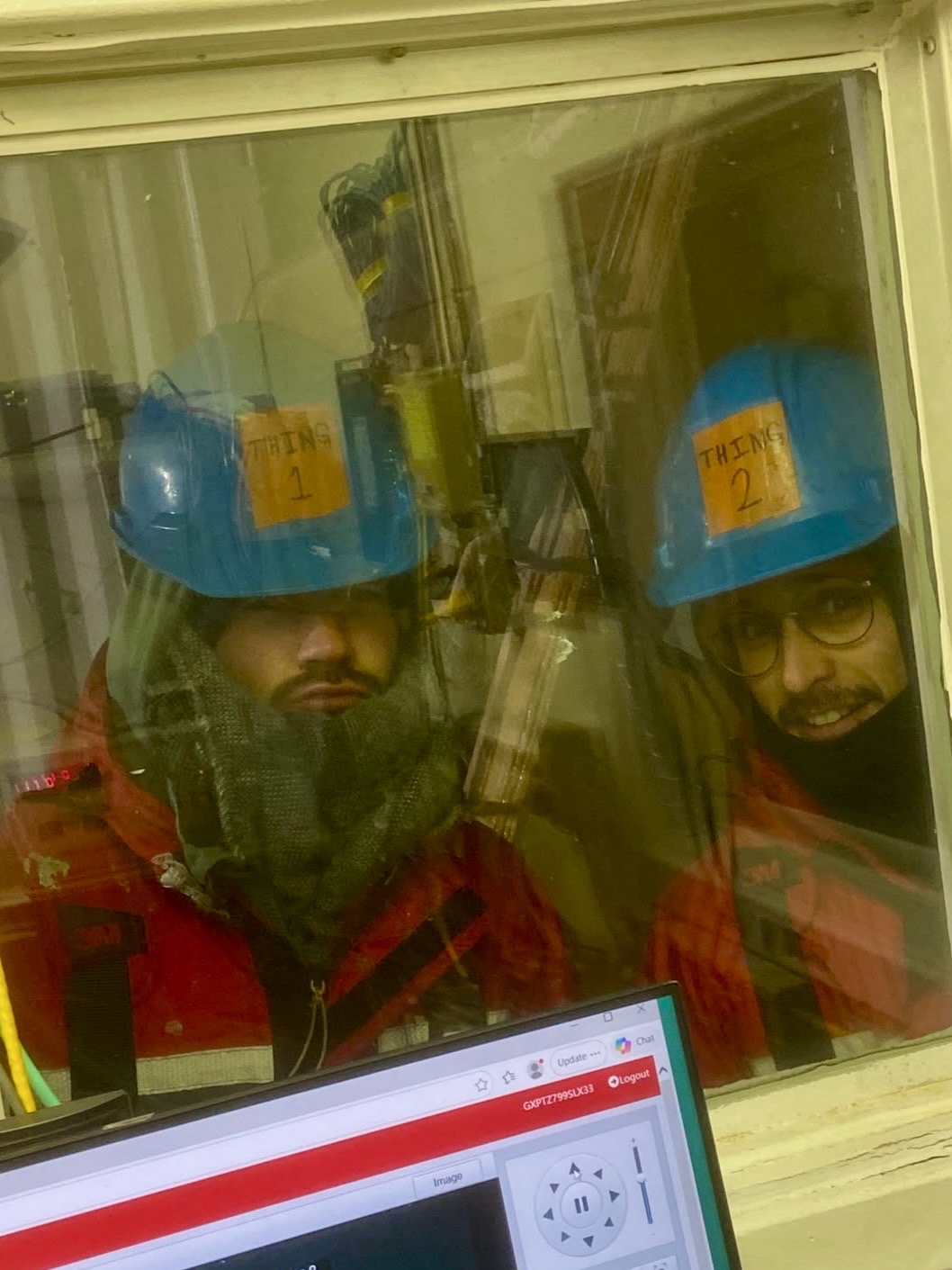 Clement Feriot (left) and Kalum Delaney (right) braving the cold and dark to monitor the rosette wire. Photo by Collette Leclerc. 