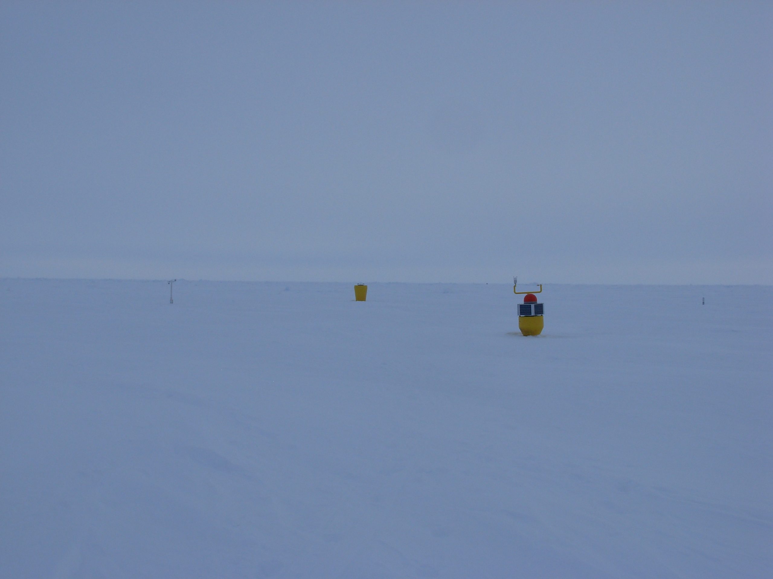 Ice-Based Observatory deployed at ice camp Barneo including (from left to right) S-IMB, ITP 95, AOFB and Ice-T. (Photo by Rick Krishfield)