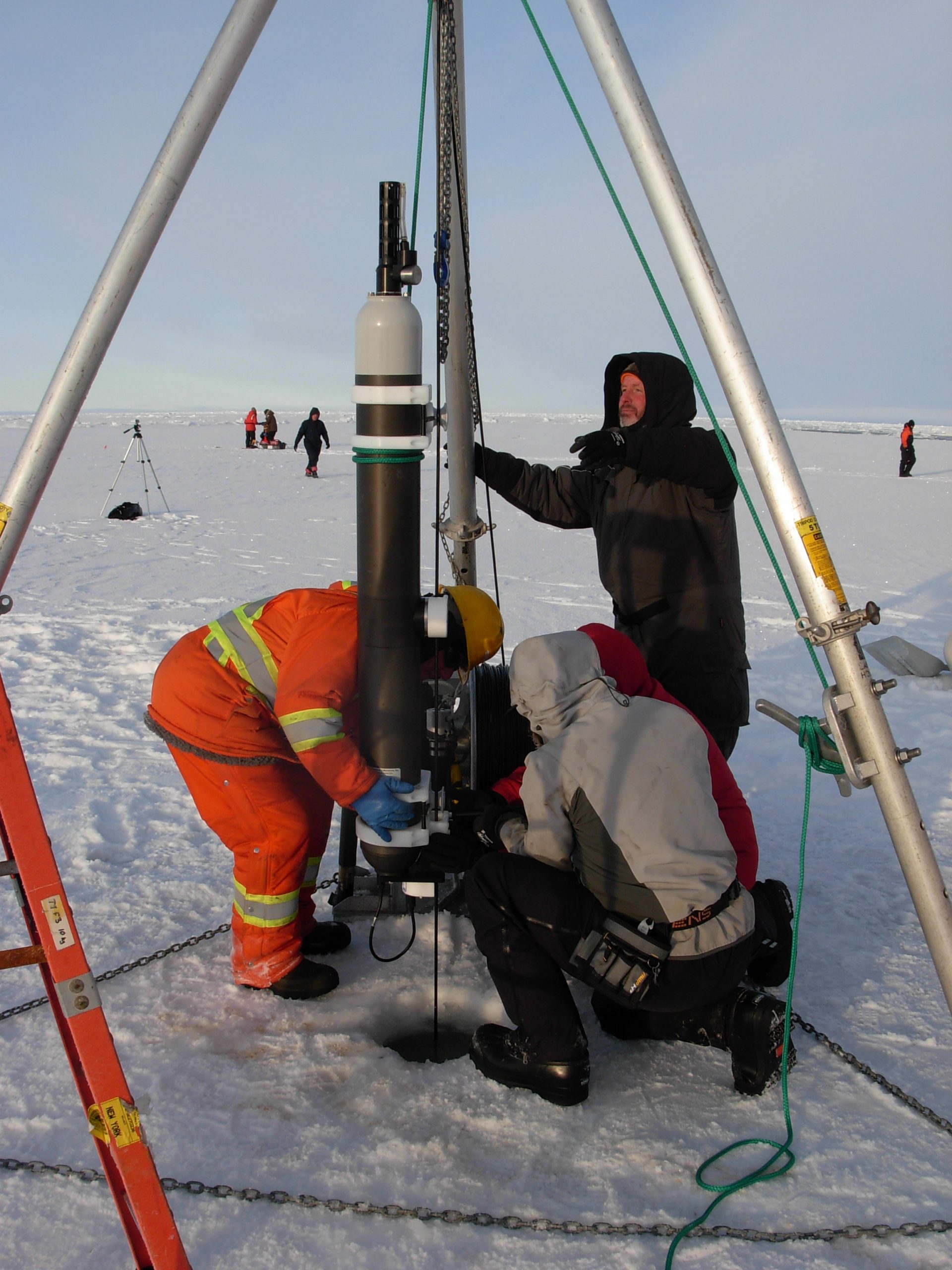 ITP 108 profiler being lowered into the ice hole. (Photo by Rick Krishfield)