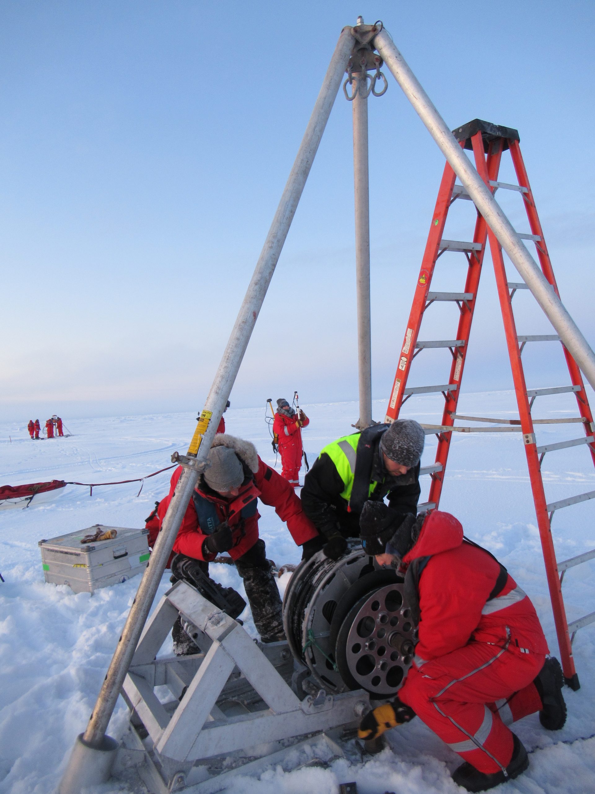 Davies, Basque, and Sam Cornish move the 790m spool of wire into position on the winch for deployment. (Photo by Andy Davies)