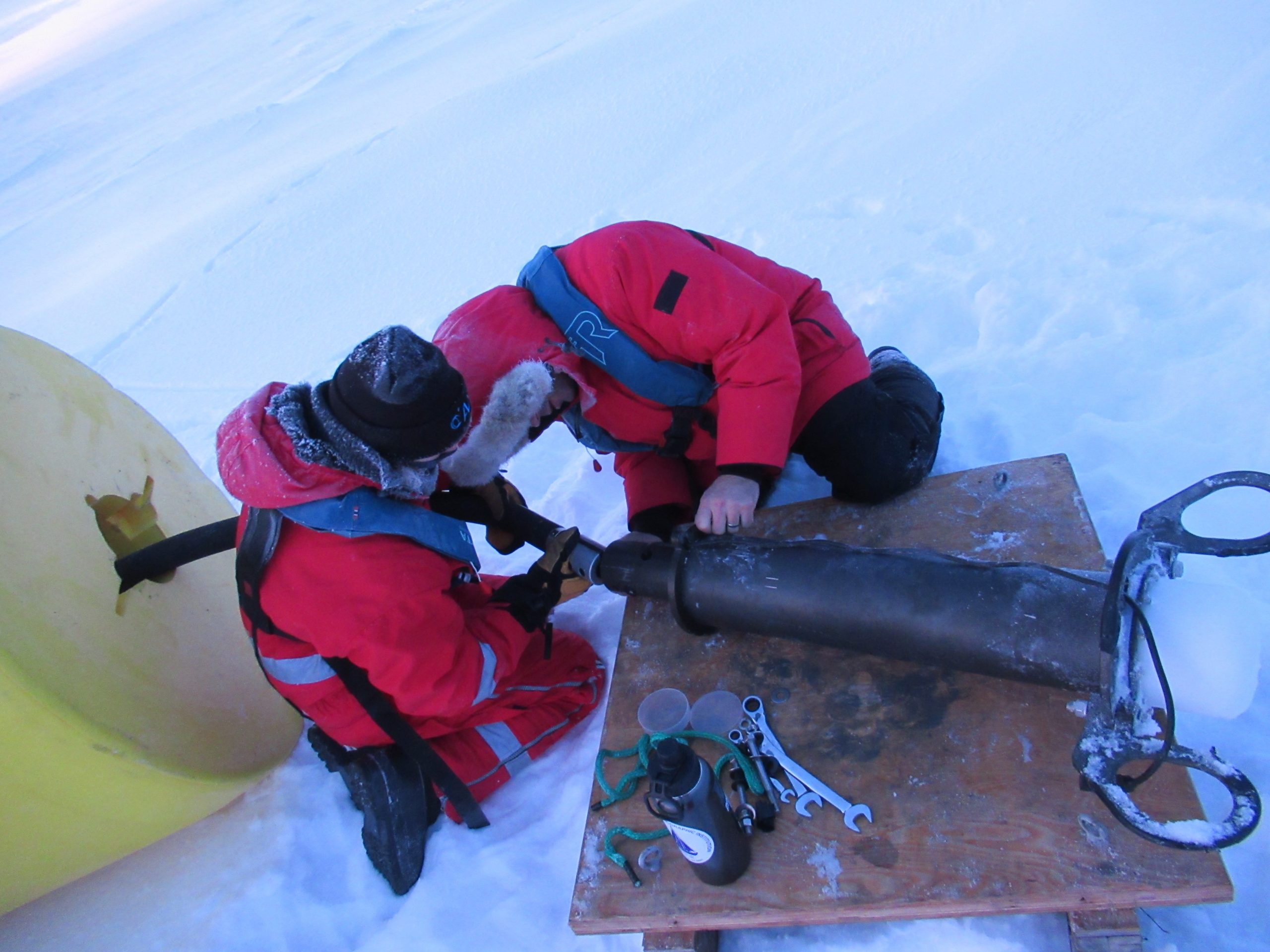 Connecting the Surface controller to the stretch hose below the buoy hull.