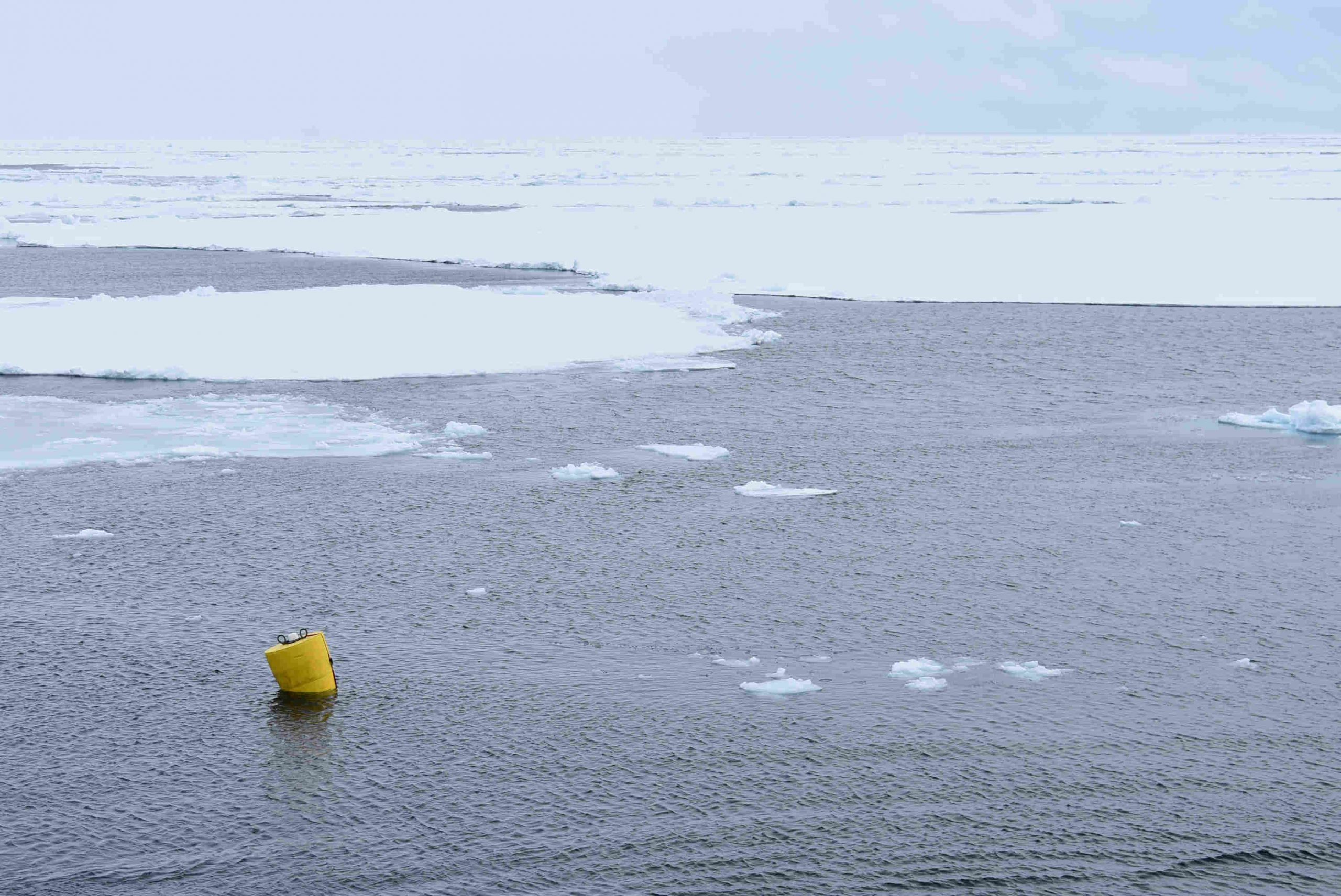 ITP 124 deployed between sea ice floes in the hopes that it will be frozen in.