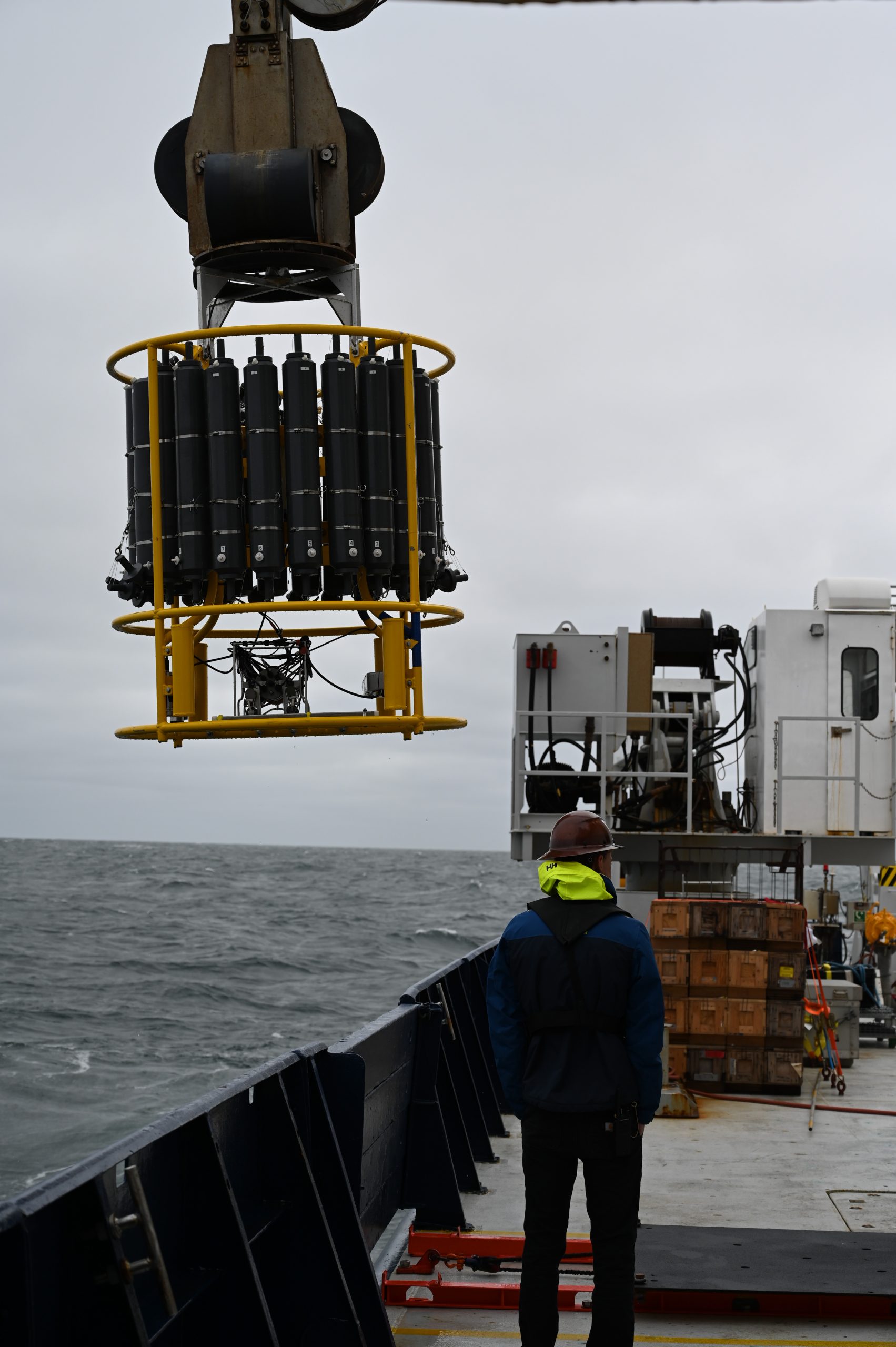 LIN_0400 Andrew Naslund provides deck support while launching a conductivity-temperature-depth (CTD) instrument overboard.