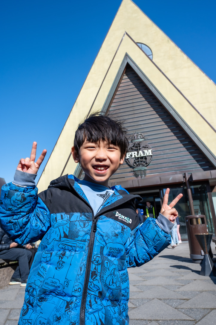 Unknown-2 Fram Lin before his namesake museum, Oslo, Norway. Credit: Peigen Lin.