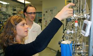 Chiara Sanitelli, a visiting scientist from the Institute of Biophysics in Pisa, Italy, works on a vacuum line