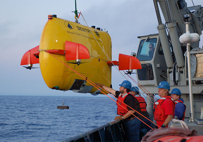 The autonomous underwater vehicle (AUV) Sentry is capable of exploring ocean depths to 6000 meters and of carrying a host of cameras and sensors. (Photo by Chris Reddy, Woods Hole Oceanographic Institution.)